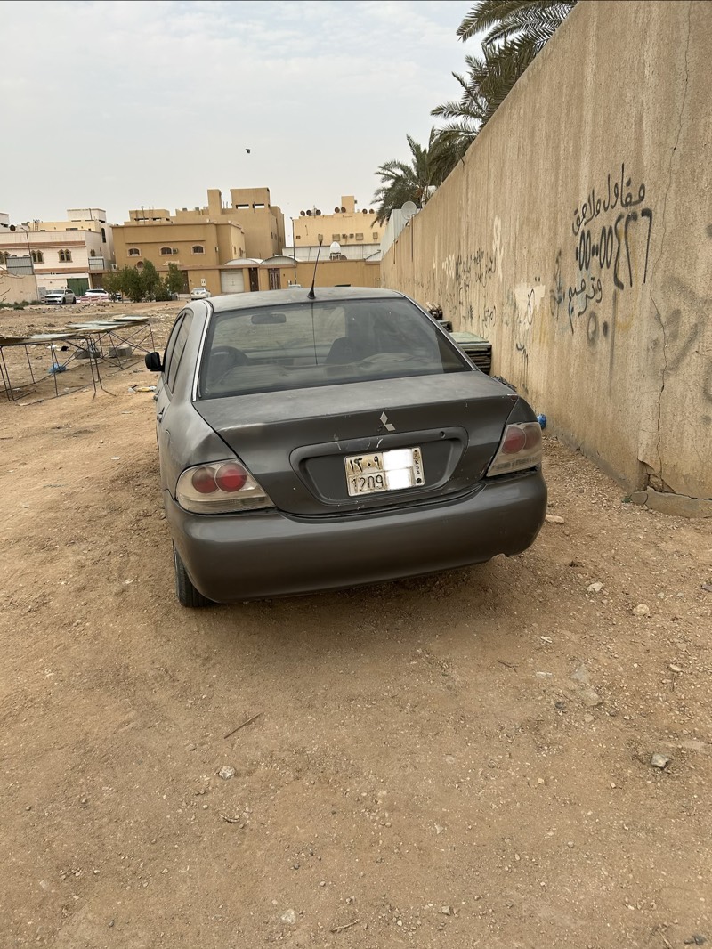لانسر GLX لون رصاصي موديل 2007